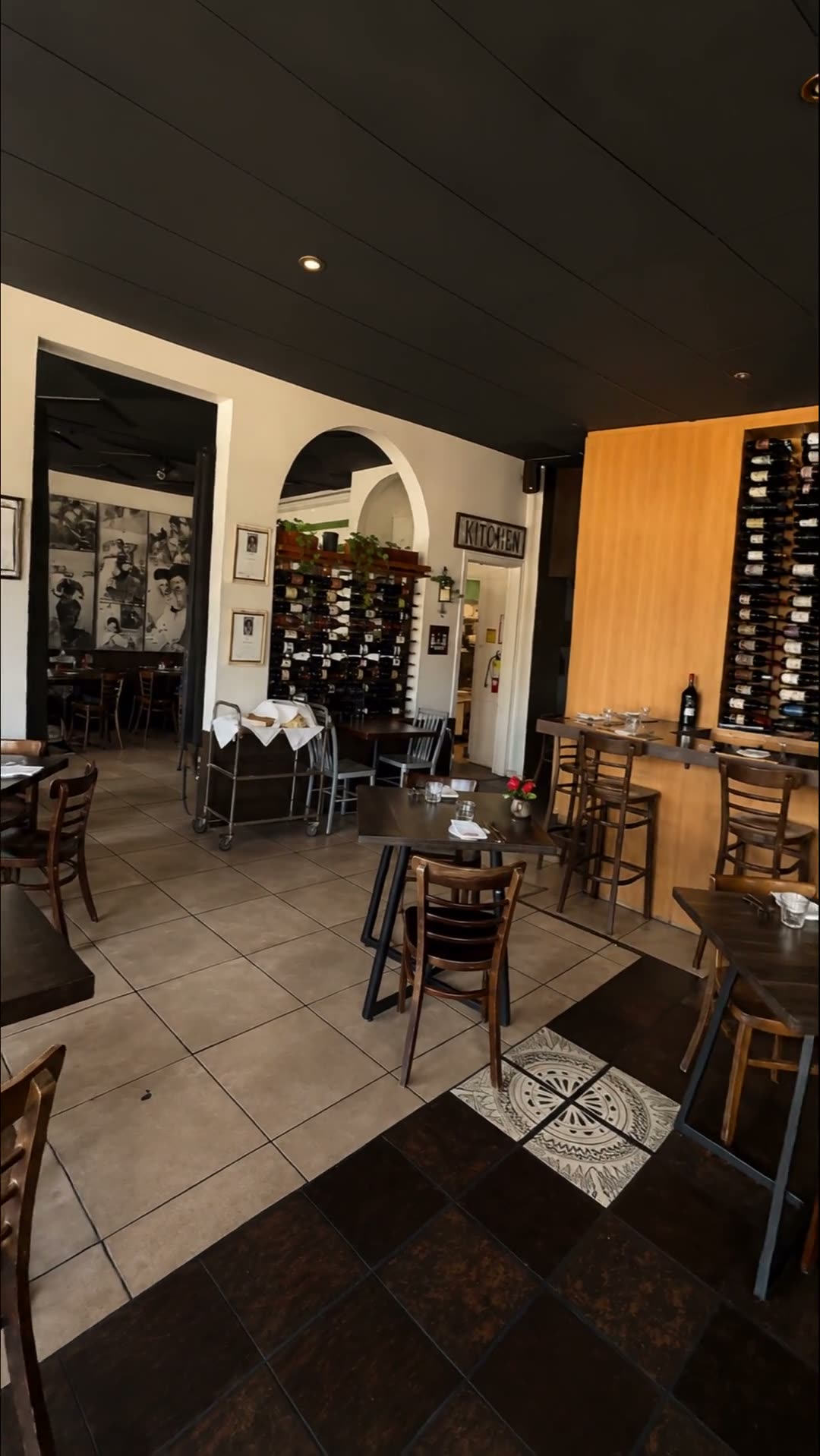 Looking down the length of the dining room toward the wine bar.